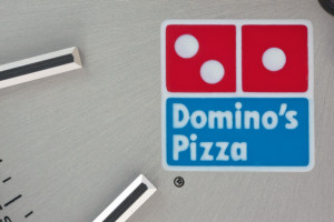 rolex dominos pizza logo